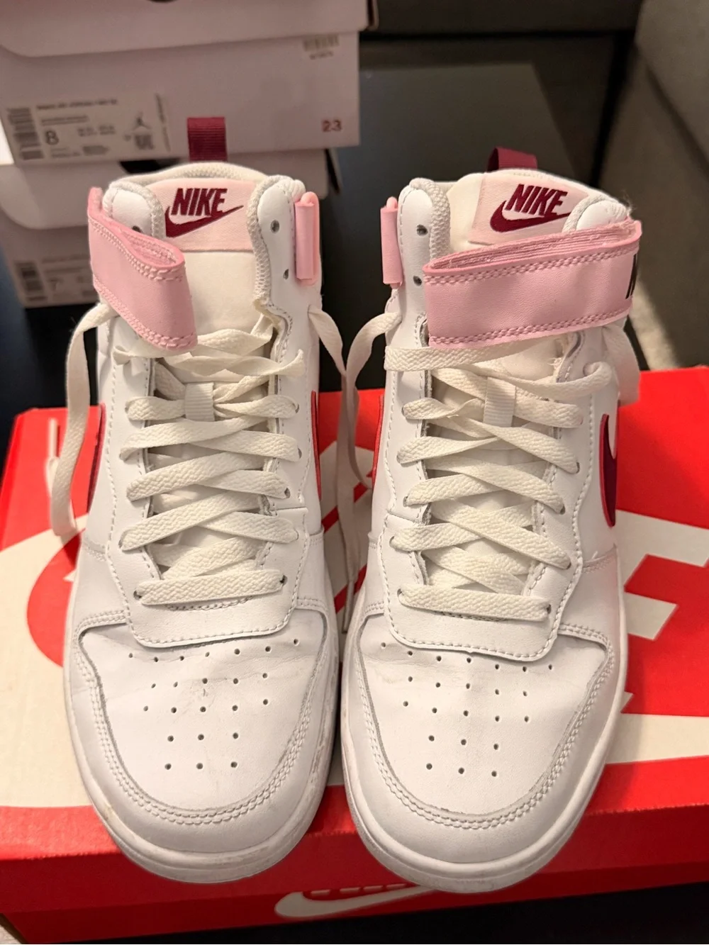 Nike White High-Top Sneakers with Pink Strap and Maroon Swoosh